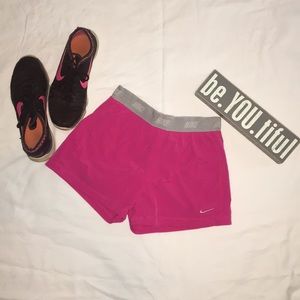 Pink Nike Drifit running shorts